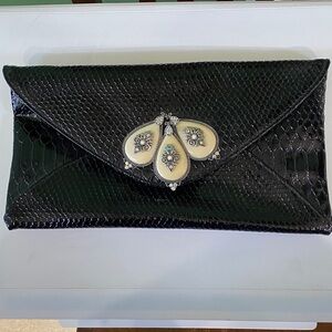 Iris Lane Elegant Black ivory stone Clutch one stone missing on right side